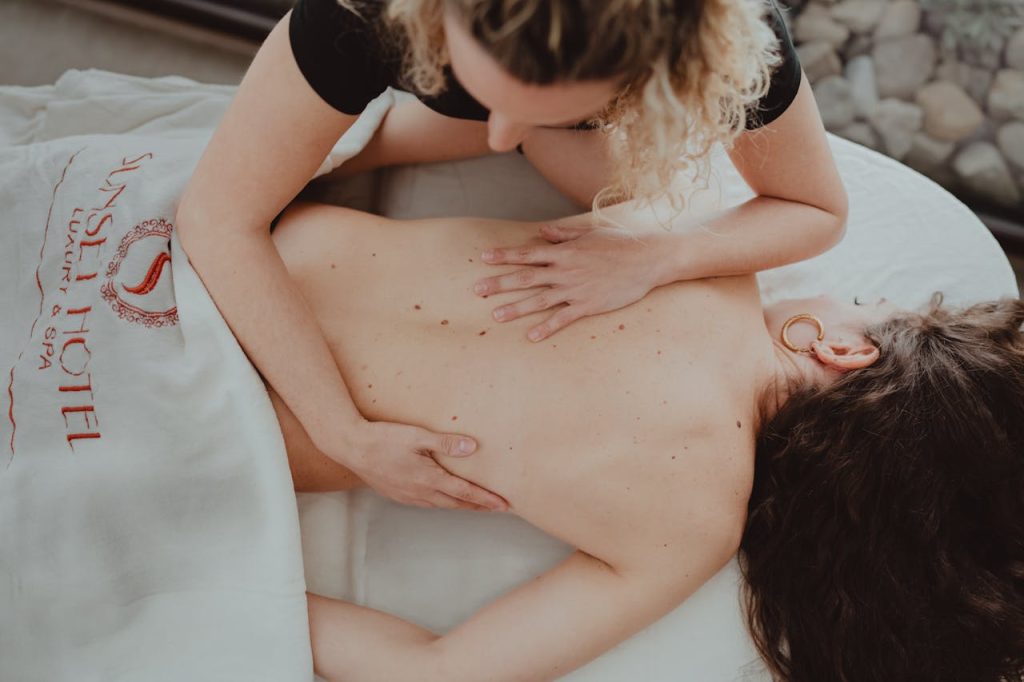 A soothing massage session at a luxury hotel spa, capturing relaxation and wellness.